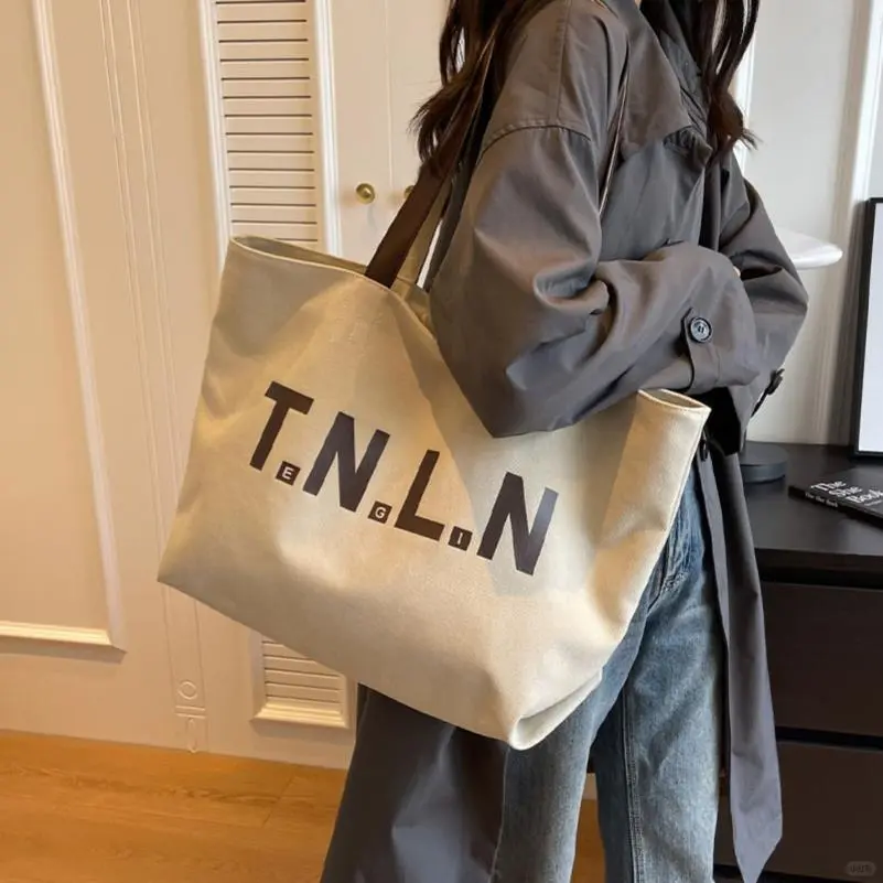 休闲大容量帆布包包女2025新款潮时尚单