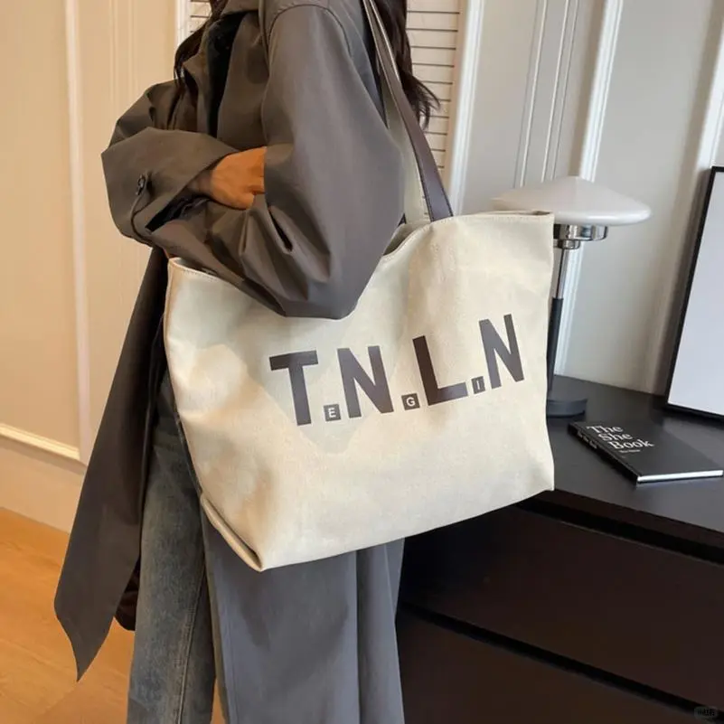 休闲大容量帆布包包女2025新款潮时尚单