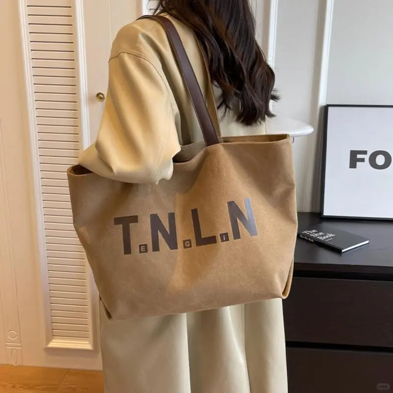 休闲大容量帆布包包女2025新款潮时尚单