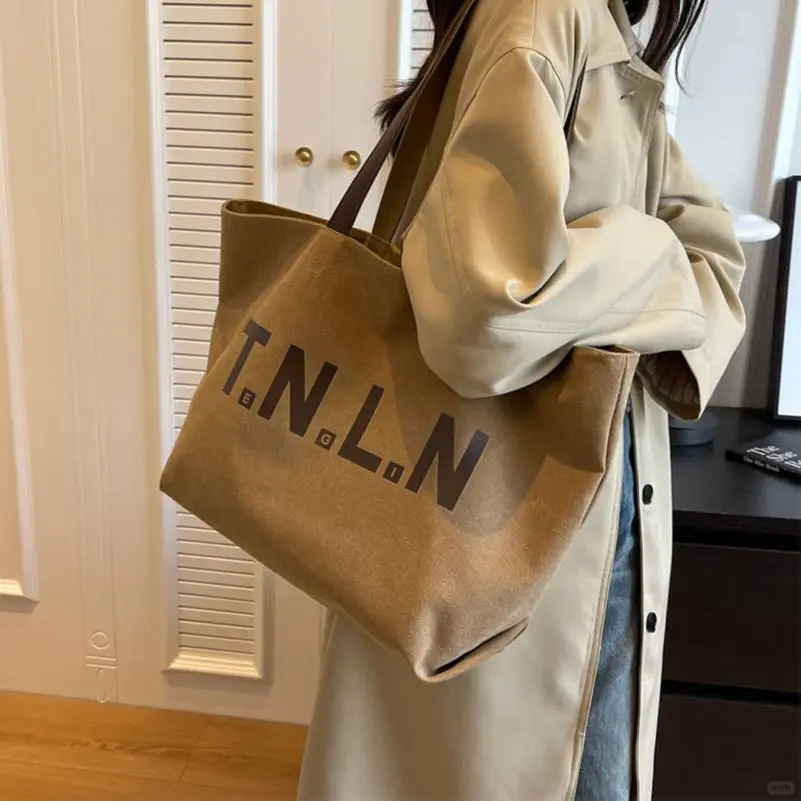 休闲大容量帆布包包女2025新款潮时尚单