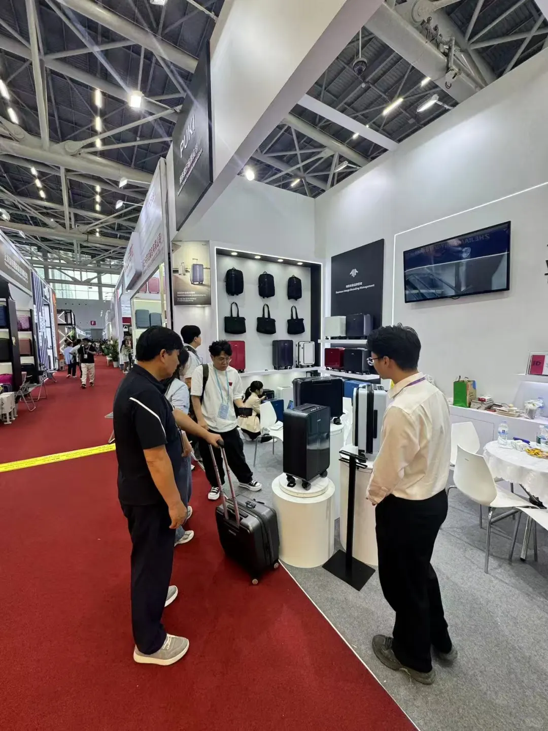 展会现场直击｜谱祺商旅在17.2F20-21等你面