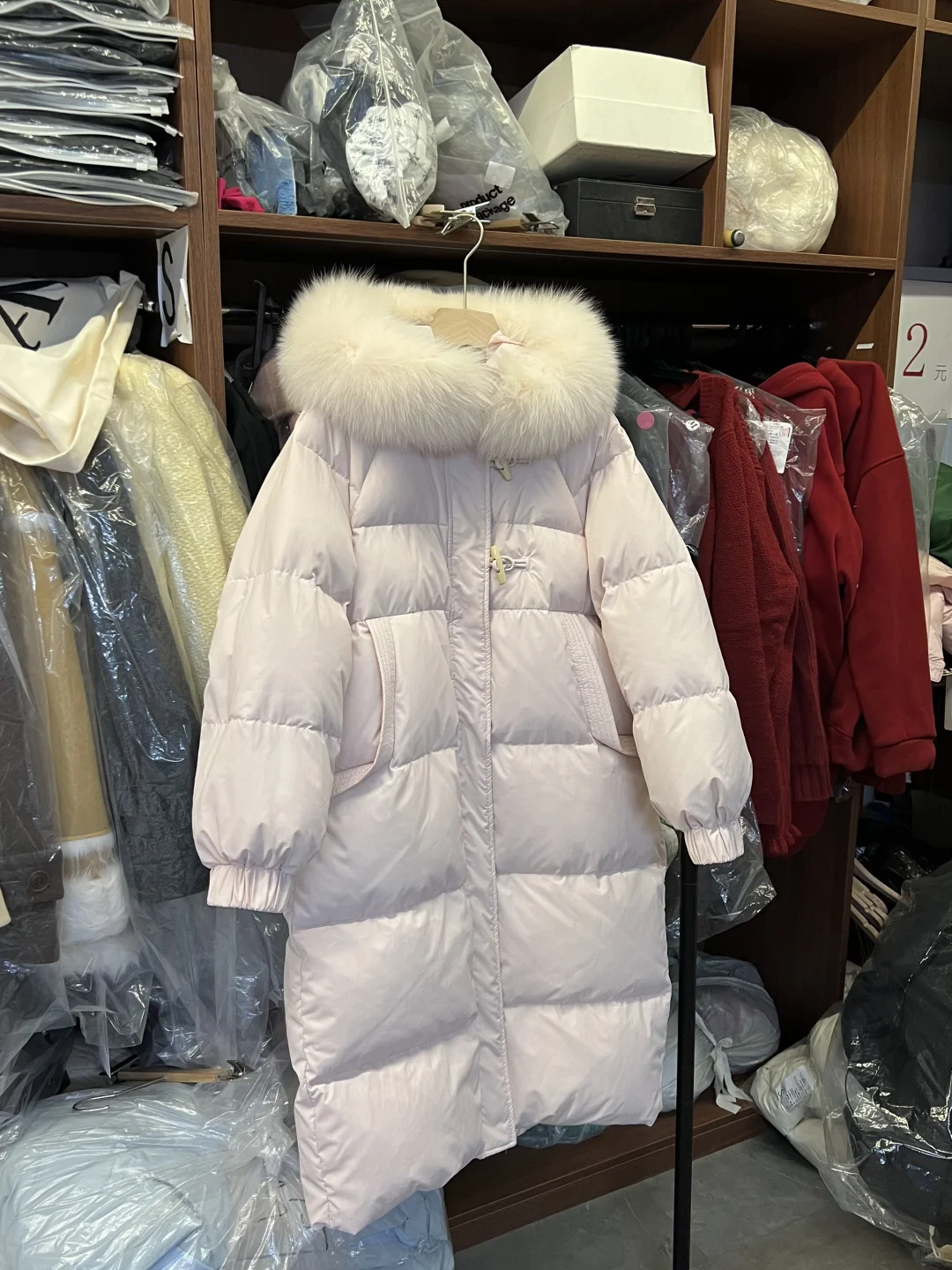 你还不知道哈尔滨本地?一家羽绒服工厂店吗