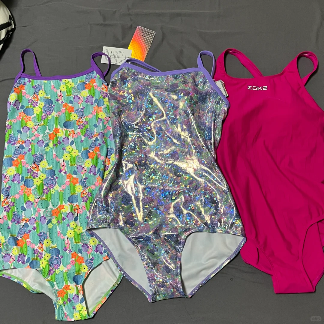 学了三节课买了三件泳衣