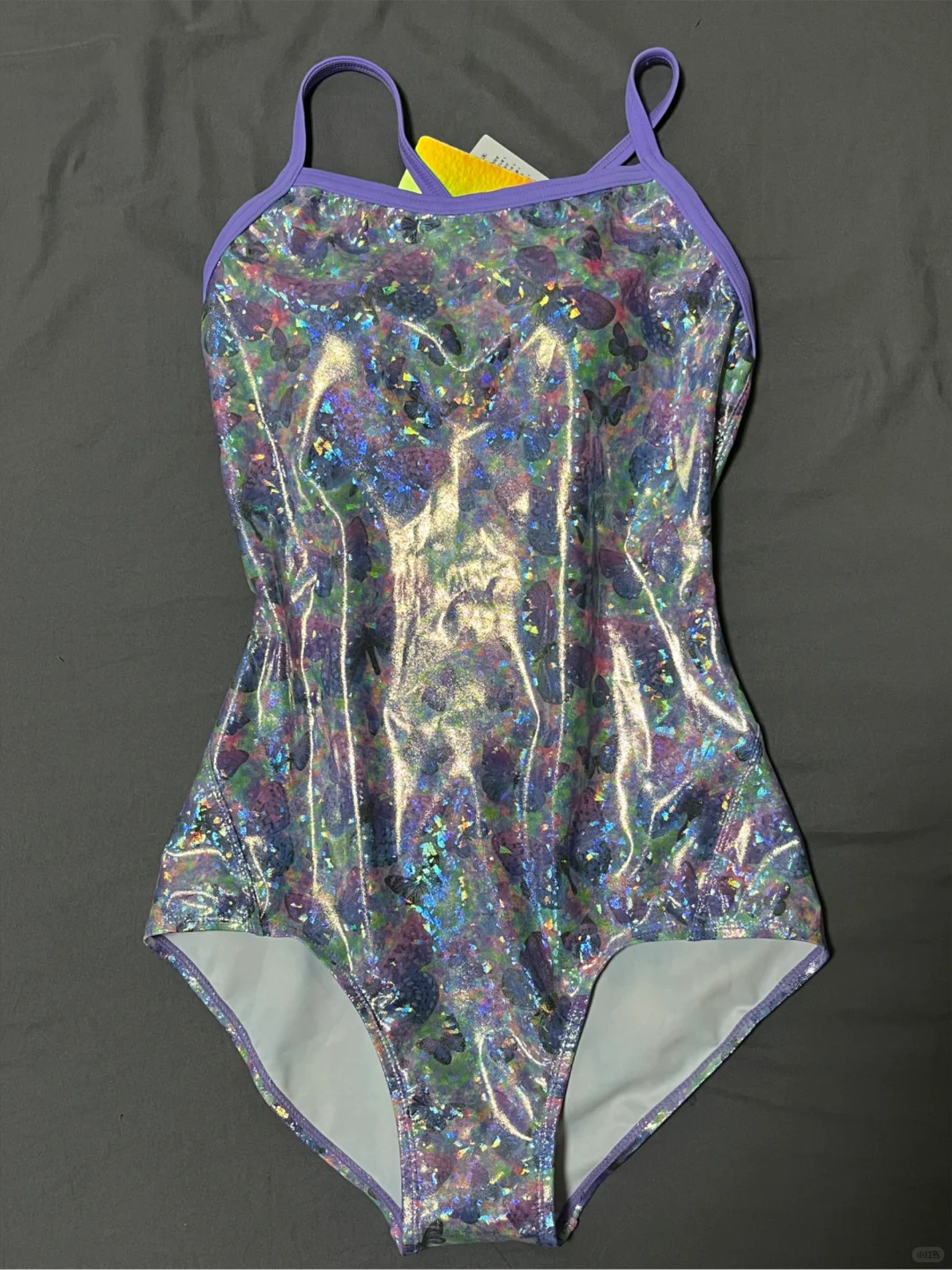 学了三节课买了三件泳衣