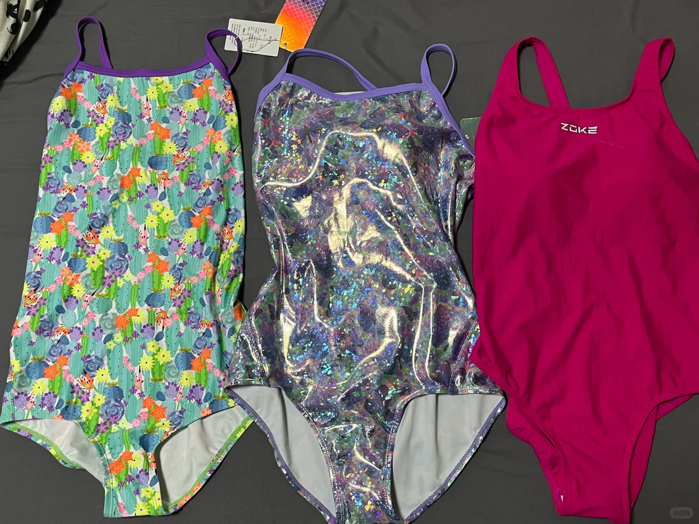 学了三节课买了三件泳衣