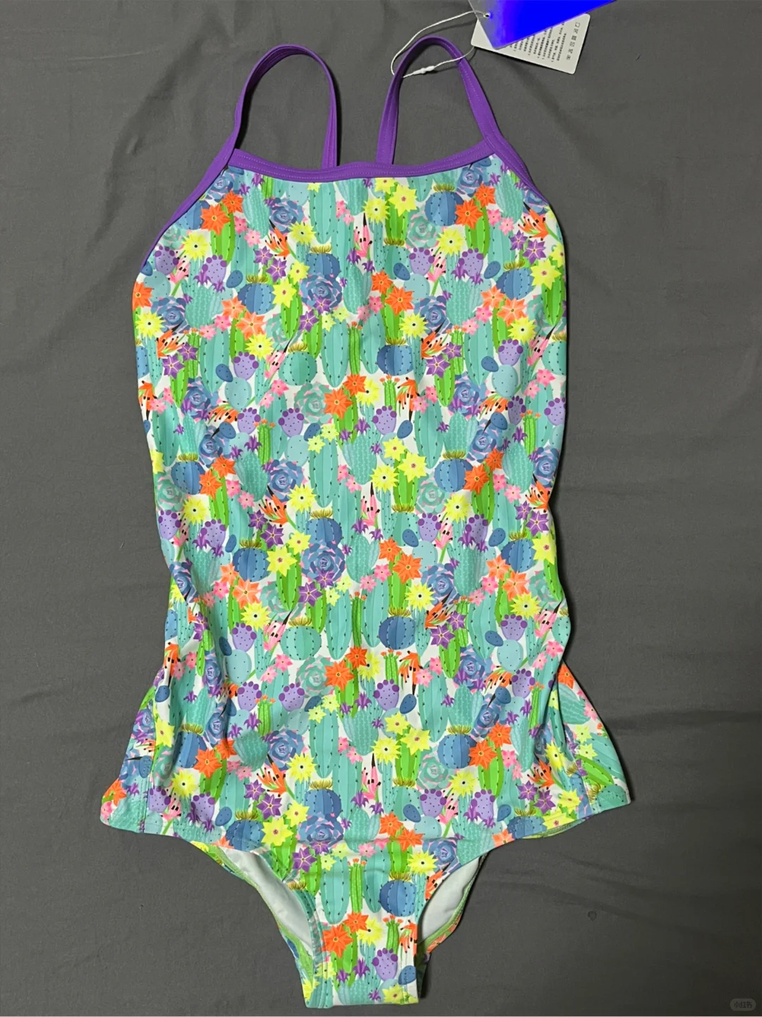 学了三节课买了三件泳衣