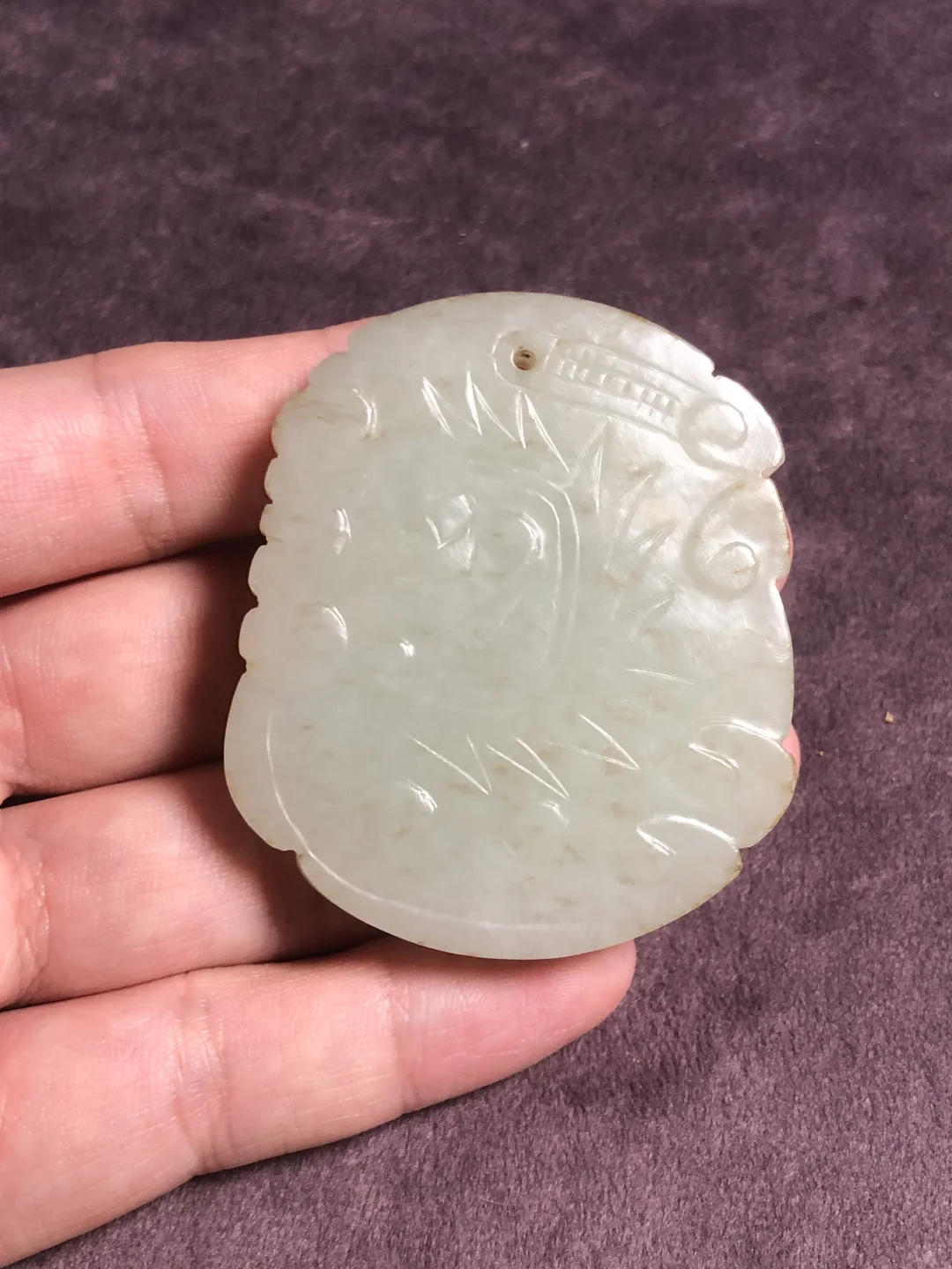 2004年天津文物展销会买的一块明代龙纹牌