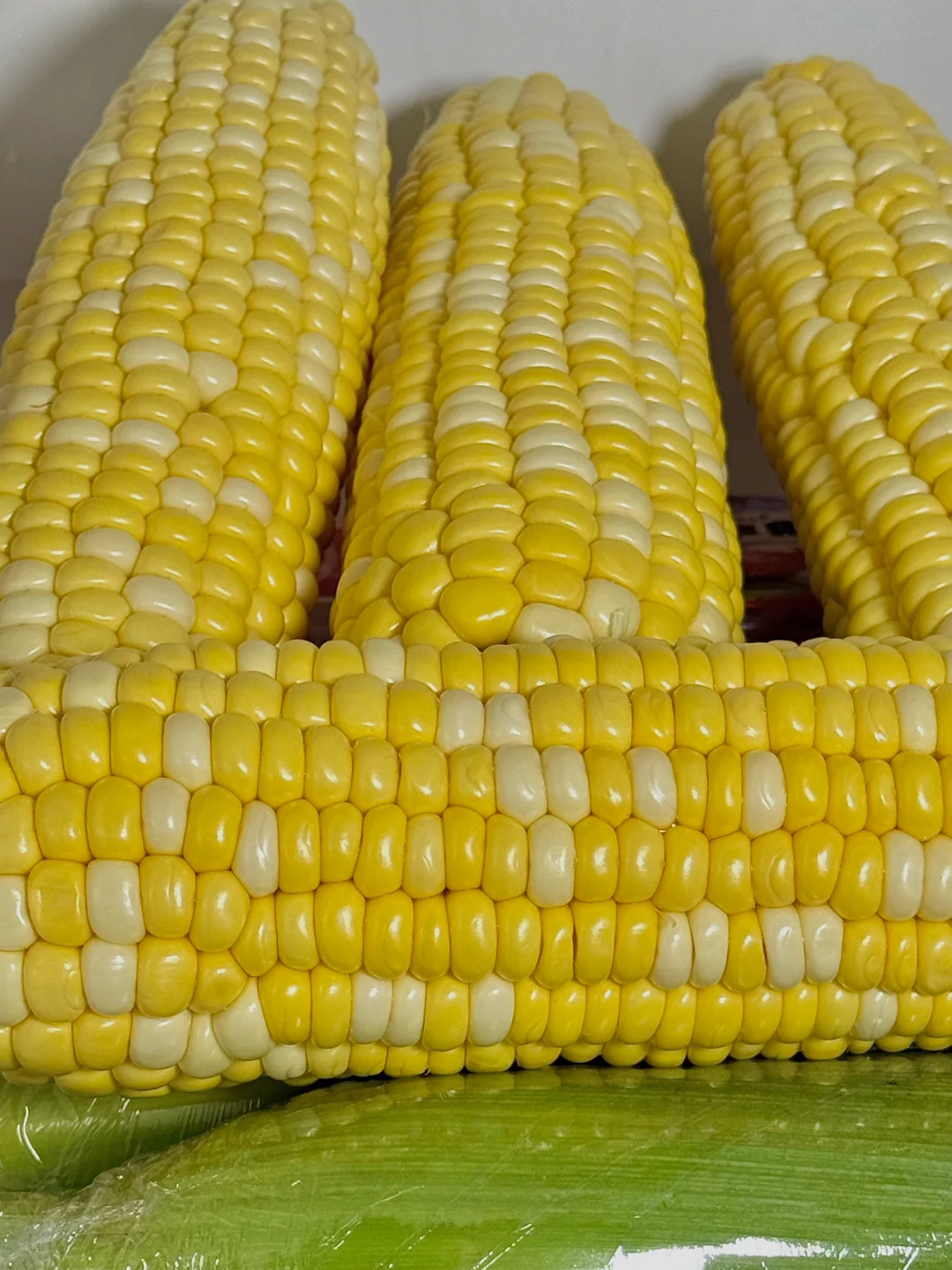 水果玉米展销会卖你7块一根，我9.7r发你三斤