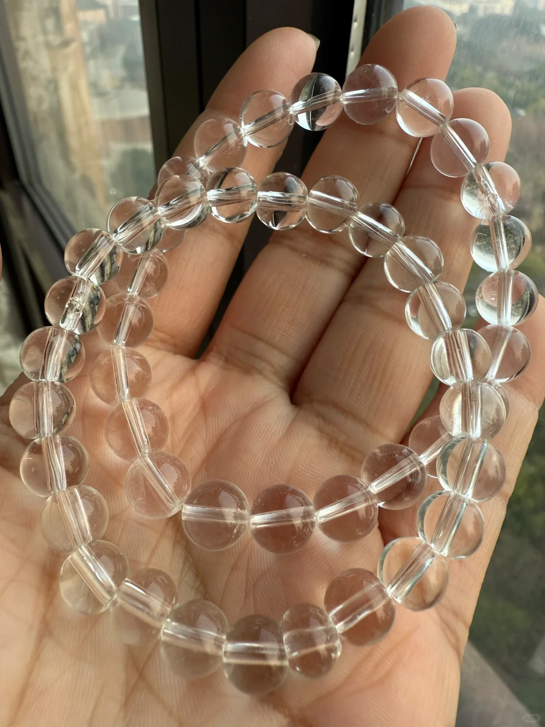 花两块钱买了串玻璃 和白水晶对比