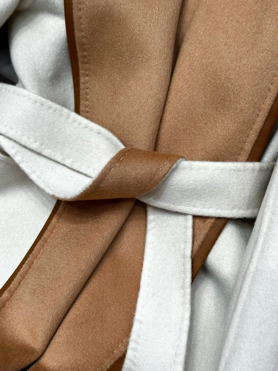 关于这件纯羊绒大衣 说点真实的数字