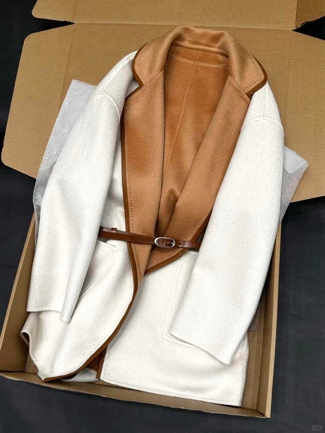 关于这件纯羊绒大衣 说点真实的数字