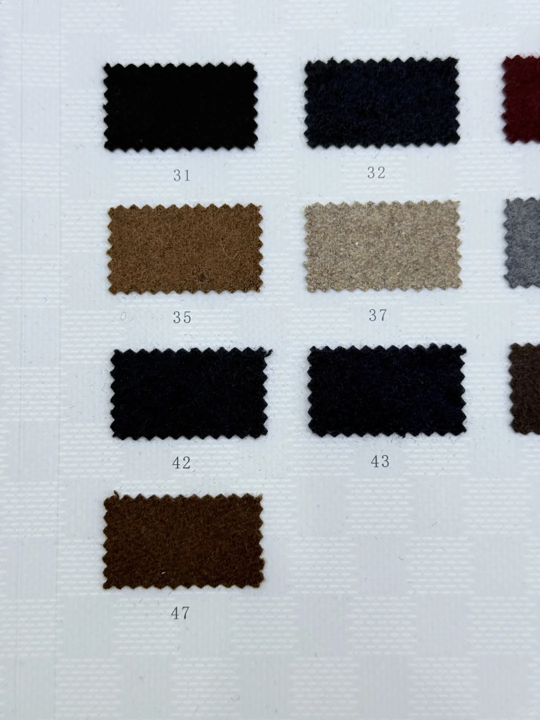 羊毛双面绒面料，细腻温暖的质感