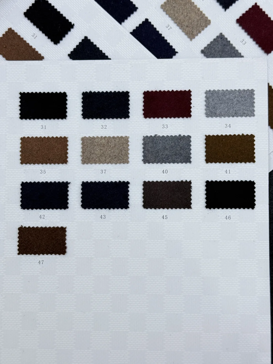 羊毛双面绒面料，细腻温暖的质感