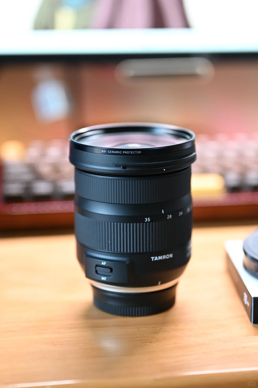 适马WR微晶玻璃和尼康致光二代选哪个