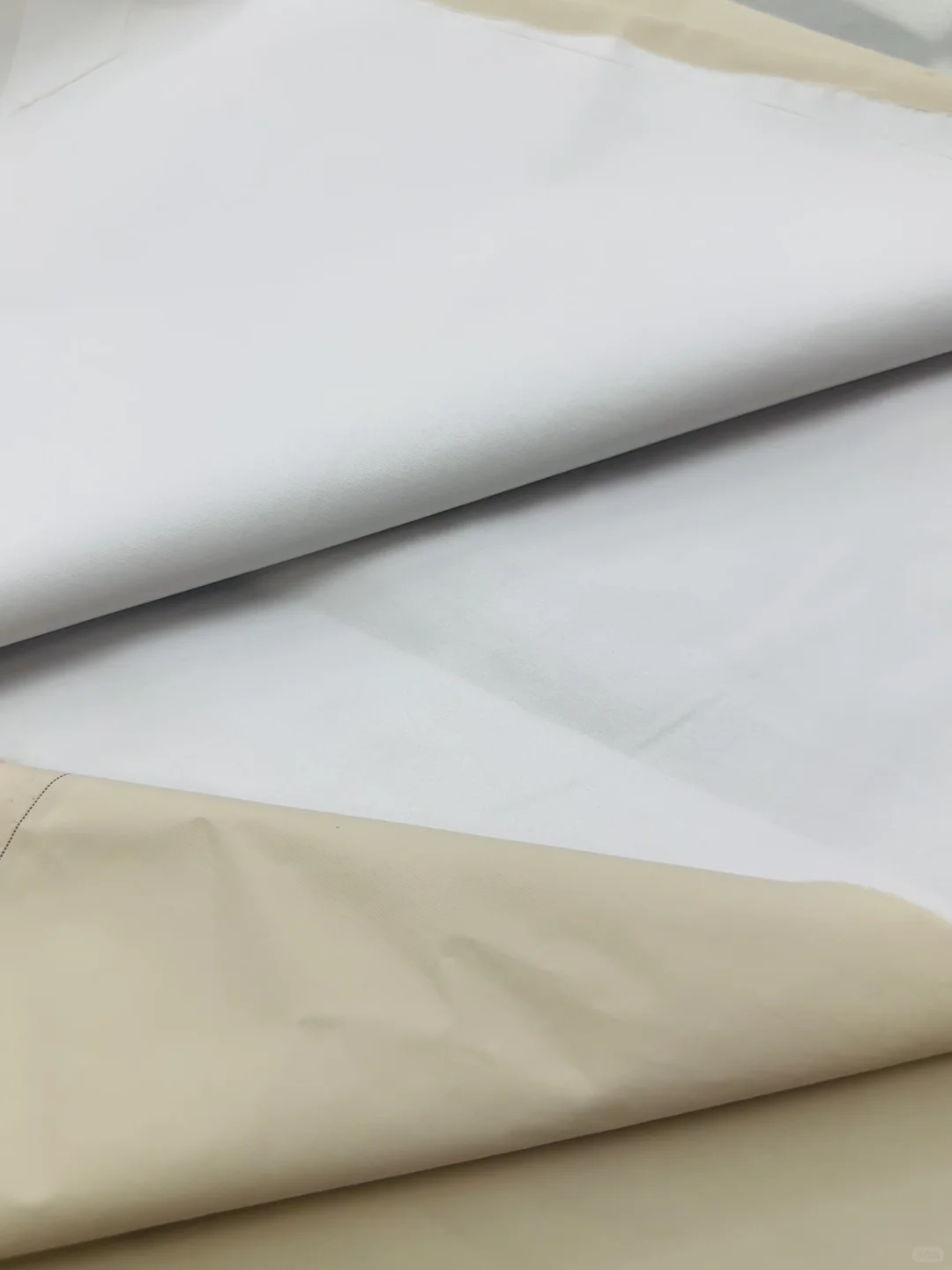 推荐一款性能不错的风衣冲锋衣面料?