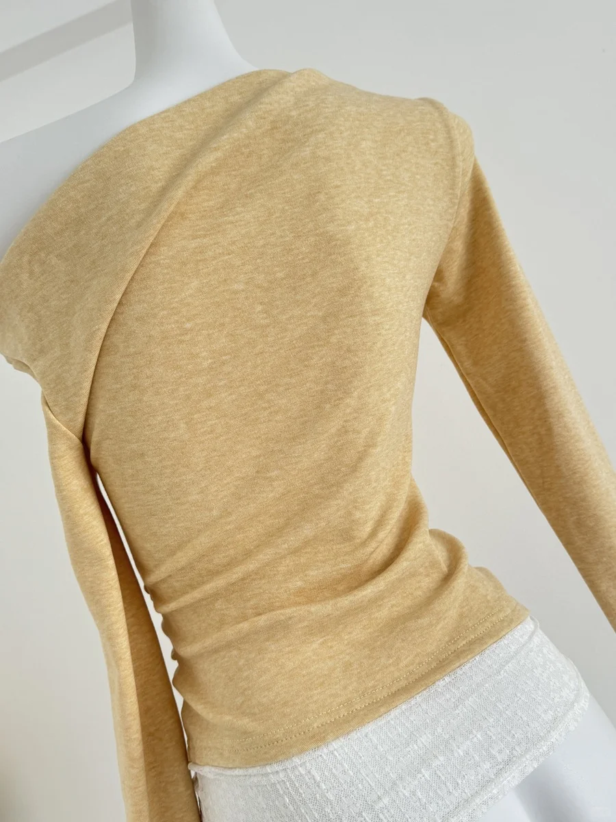 75?蕾丝拼接不对称上衣