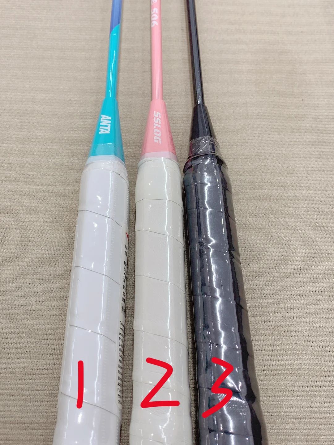 自费买下三把羽毛球拍，最后我选了..