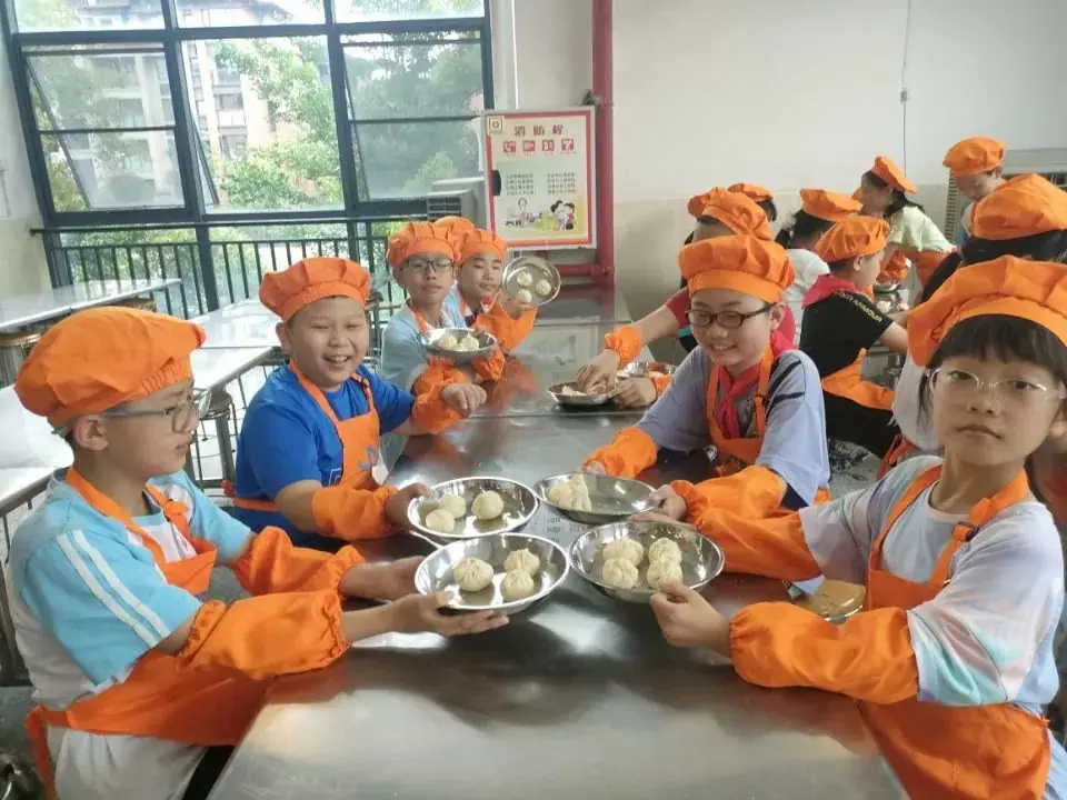 “烹”然心动,“包”出精彩 ——状元小学2024年春季五年级食育课程 第26张