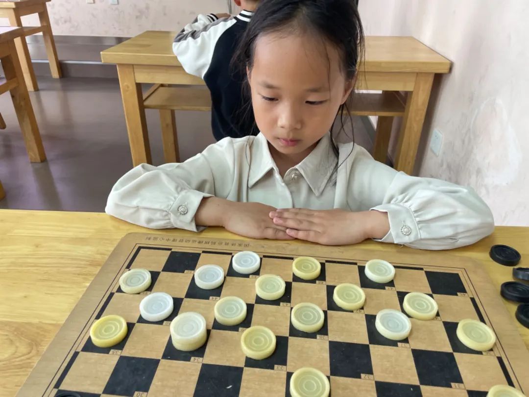 棋乐无穷 弈路成长——2024年天生港小学国际跳棋“棋王、棋后”争霸赛 第10张