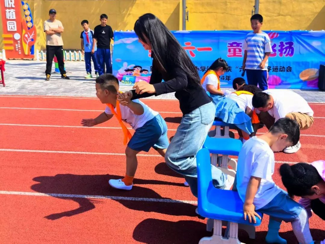 【创新·一小】新民市城区第一小学幼儿园“缤纷六一  童心飞扬”庆“六一”亲子运动会 第35张