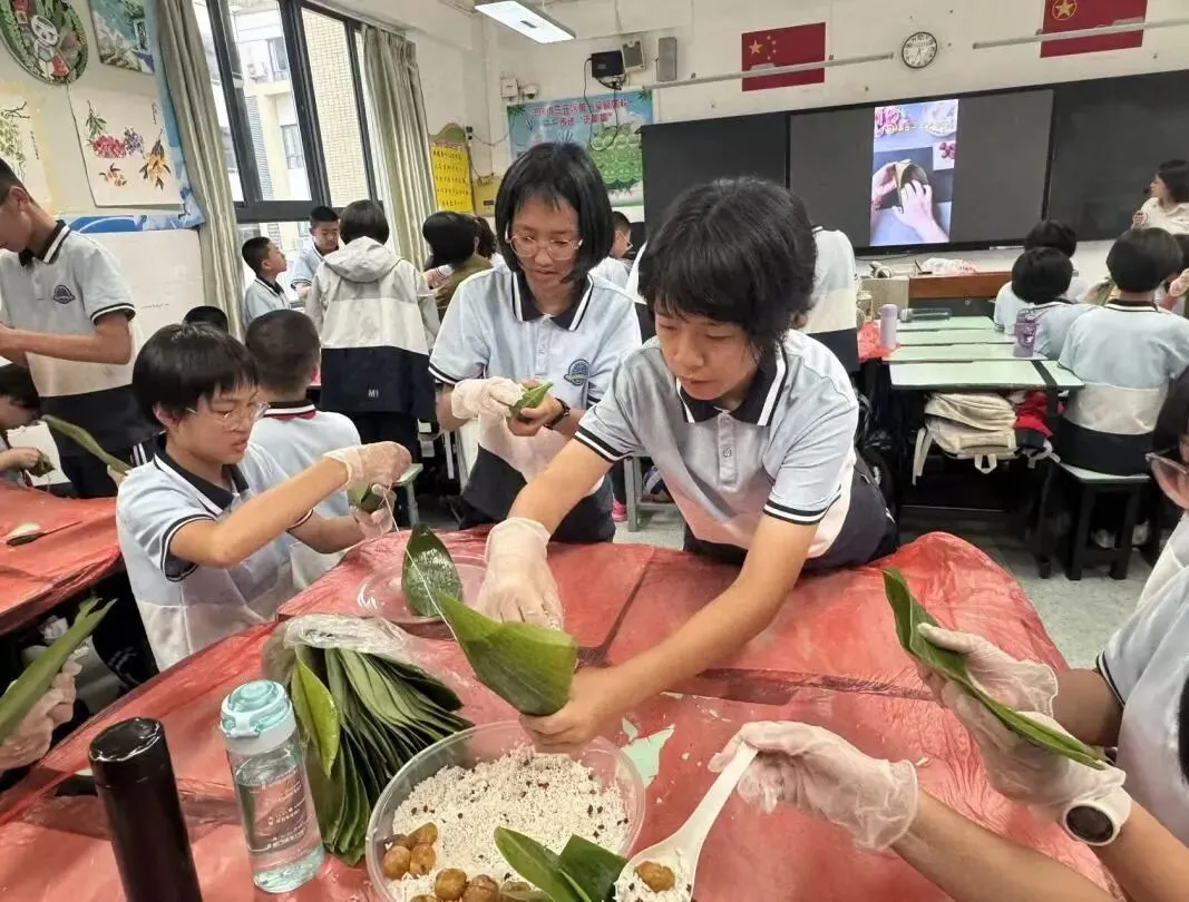 迎端午 传匠心 助中考—记M1七年1班包粽子比赛 第67张 迎端午 传匠心 助中考—记M1七年1班包粽子比赛 第67张