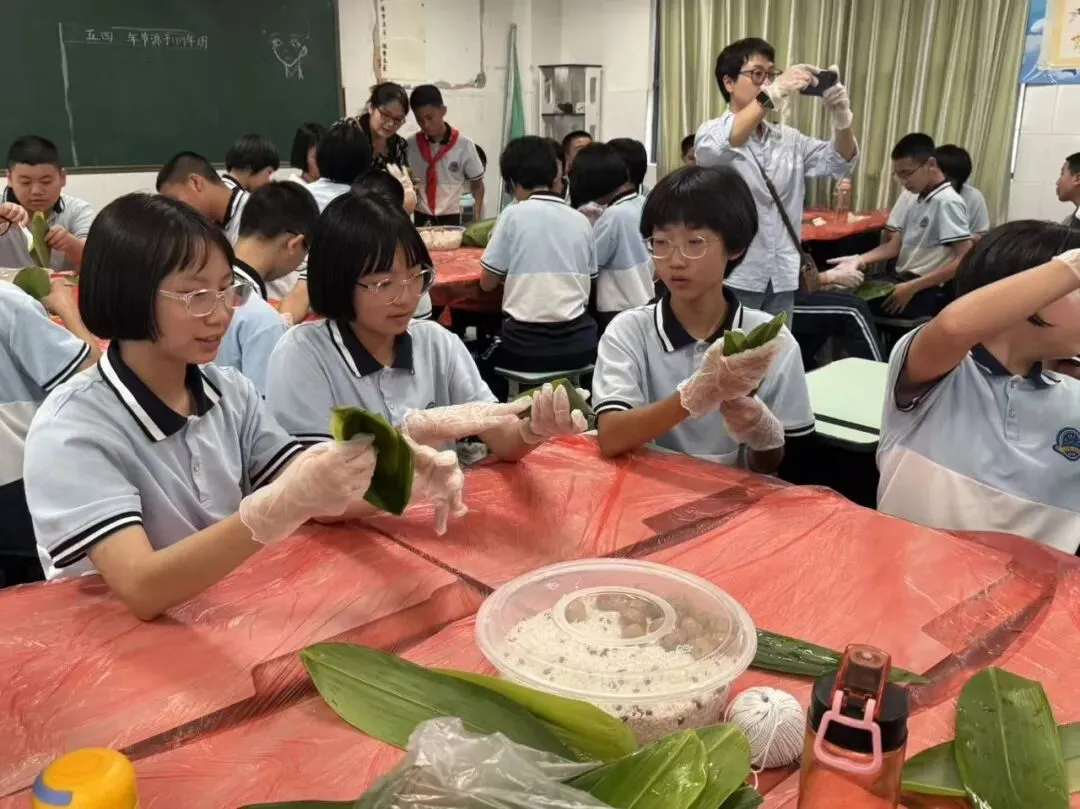 迎端午 传匠心 助中考—记M1七年1班包粽子比赛 第70张 迎端午 传匠心 助中考—记M1七年1班包粽子比赛 第70张