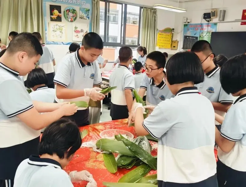 迎端午 传匠心 助中考—记M1七年1班包粽子比赛 第90张 迎端午 传匠心 助中考—记M1七年1班包粽子比赛 第90张