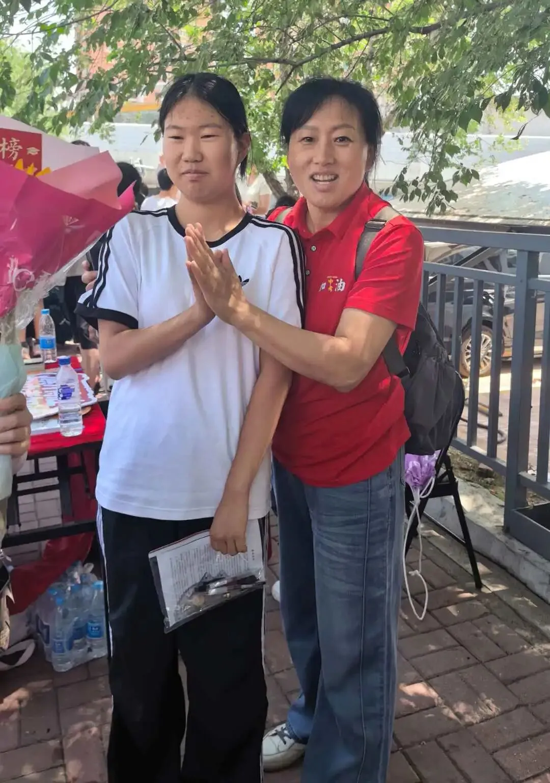 【繁荣学校·直击中考】红装相伴 暖心护航——2026届吉林省实验繁荣学校带考掠影(一)-第55张图片-四季读书网