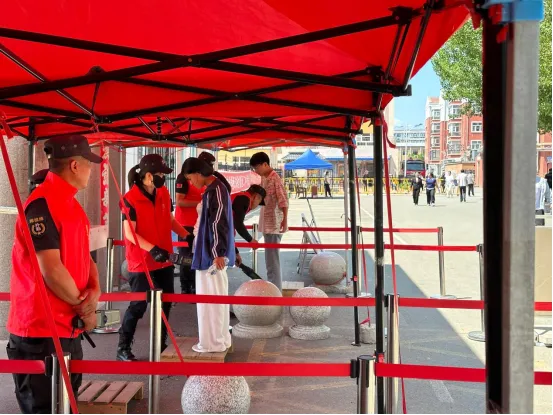 梅里斯橄榄绿 护航中考逐梦路——区退役军人事务局“橄榄绿”志愿服务队保障在行动-第2张图片-四季读书网
