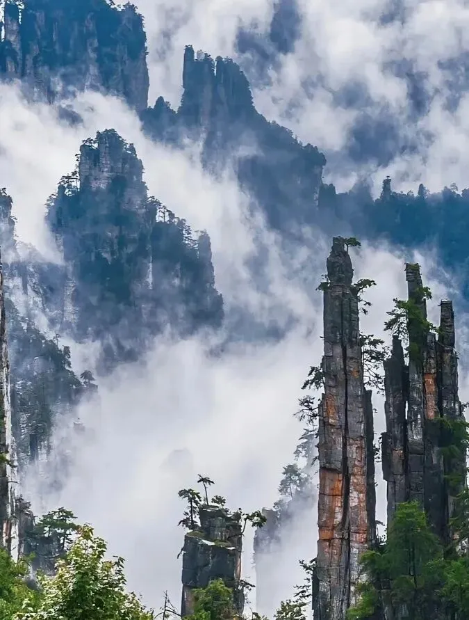 张家界旅游攻略:5 天 4 晚行程 + 必玩景点 + 特色小吃,不走回头路不踩坑,吃住玩一站式搞定
