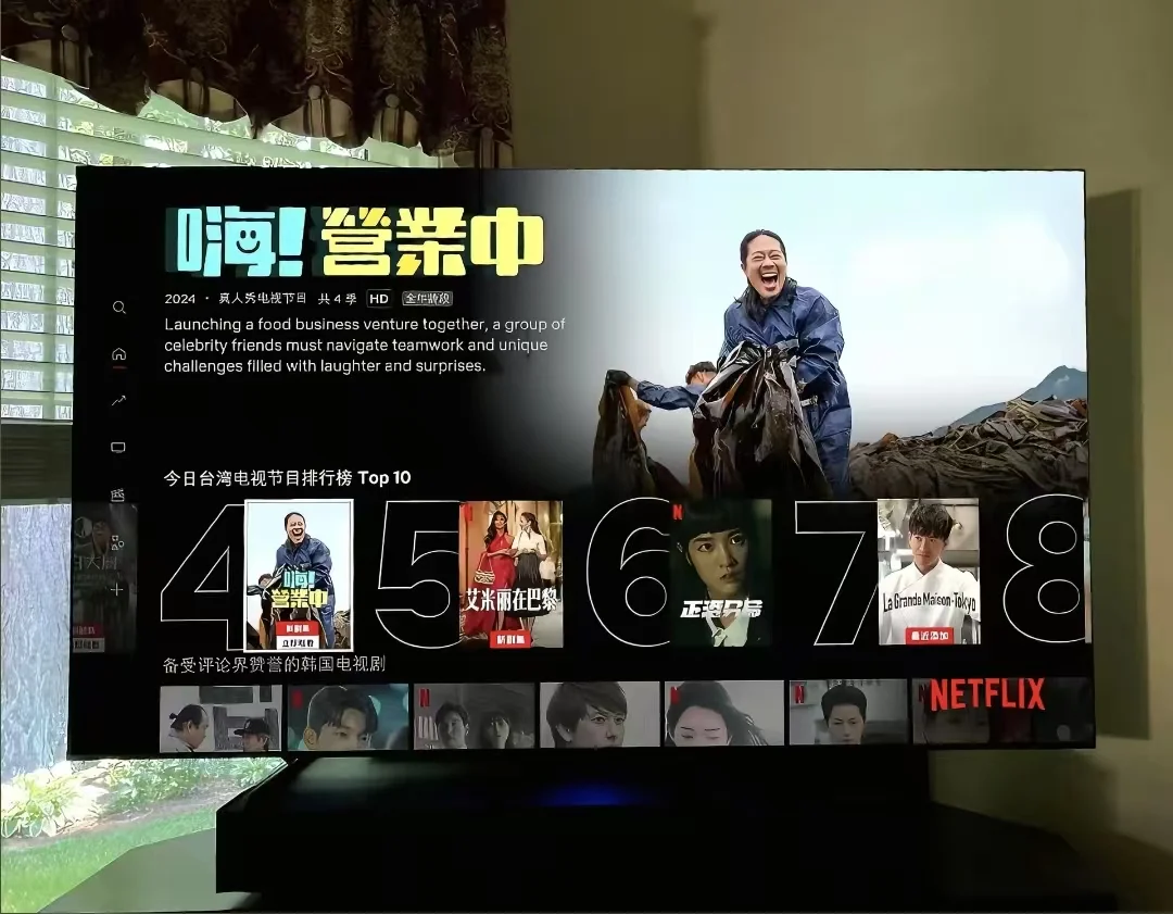 用电视背景墙营造家庭影院Tcl破解奈飞