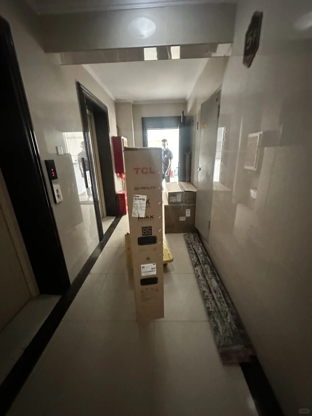 tcl85t7k 京东伸缩挂架送装一体大无语