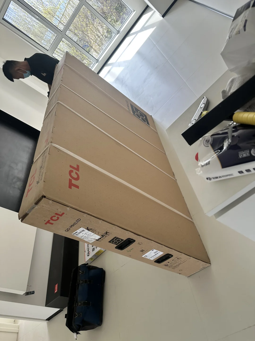 tcl85t7k 京东伸缩挂架送装一体大无语