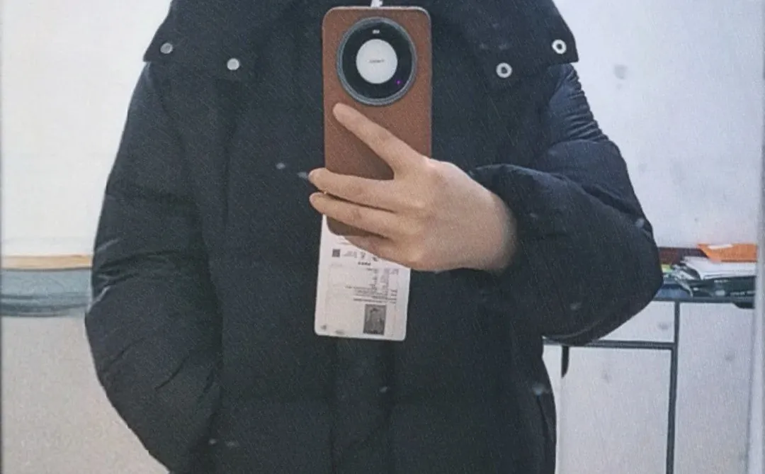 在线帮我看看这个是不是鹅绒服