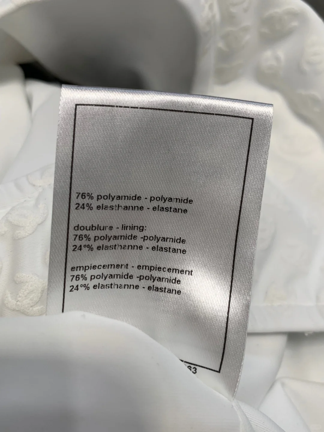 Chanel条纹蝴蝶结暗纹连体泳衣