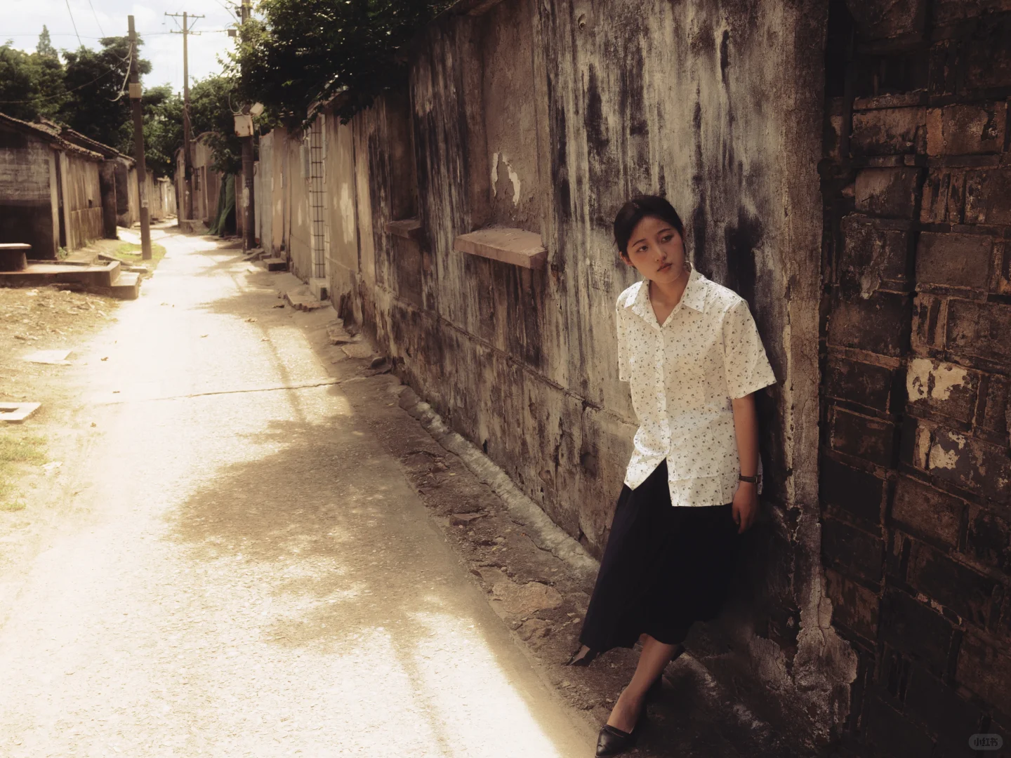「她的半生留在闷热的夏日中」