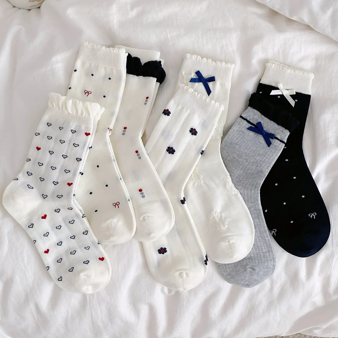 冬季软妹焊脚神器！这双波点蝴蝶结袜甜心里