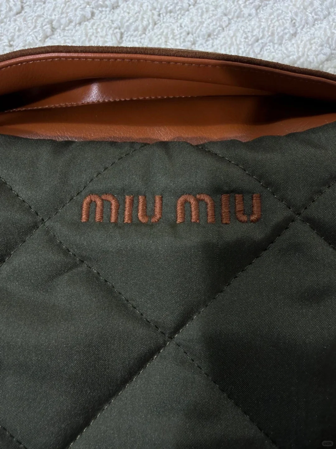 MIUMIU女士25牛皮领复古撞色绗缝夹克棉服