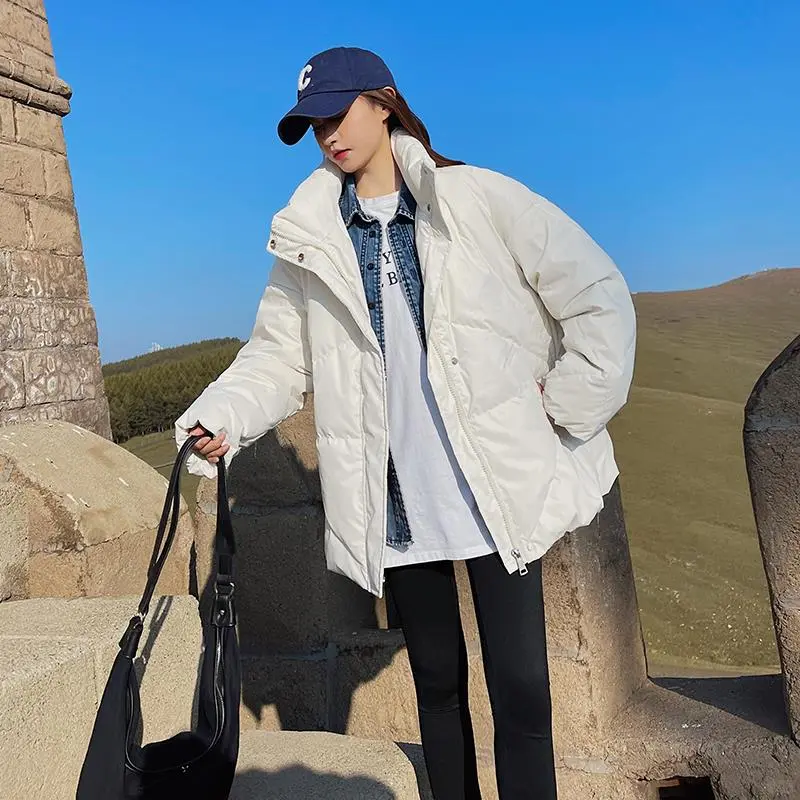 奶橘色羽绒服女2025年新款短款立领加🔥