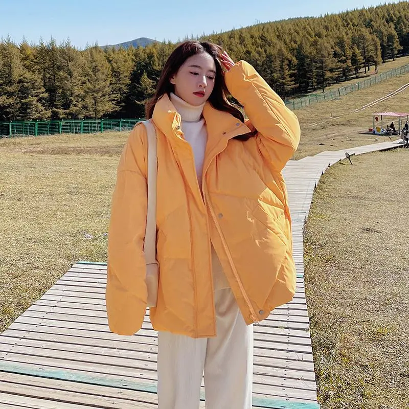 奶橘色羽绒服女2025年新款短款立领加🔥
