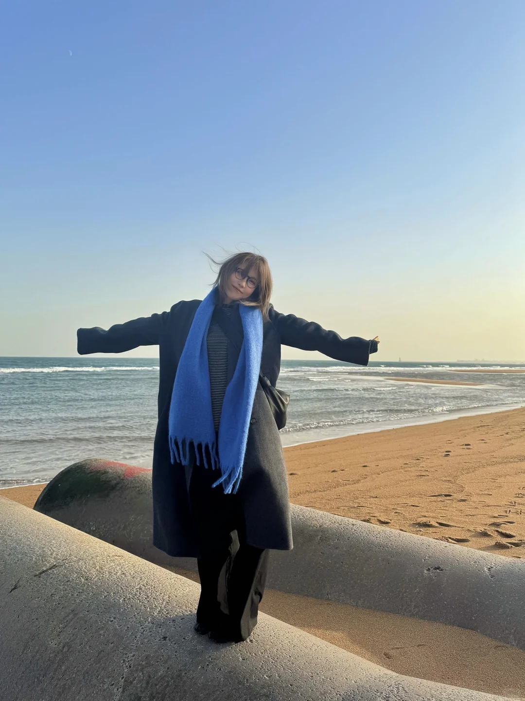 冬天 海边两小时 很浪漫 风吹的头也痛 hhh