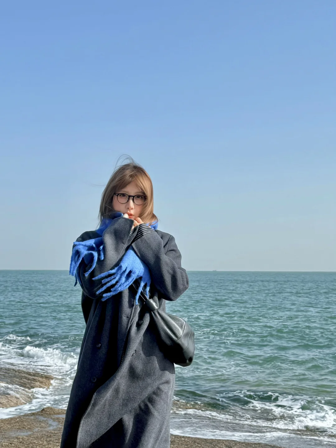 冬天 海边两小时 很浪漫 风吹的头也痛 hhh