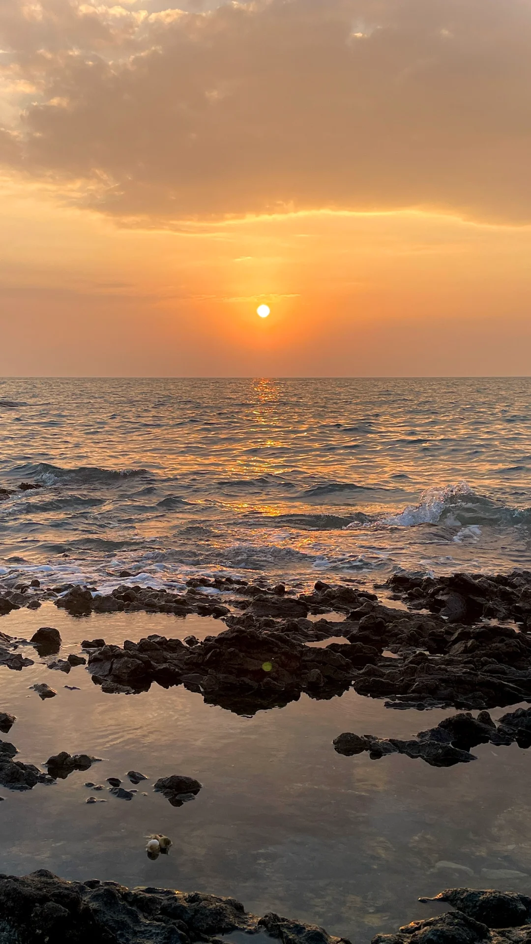 海的浪漫，日落占一半