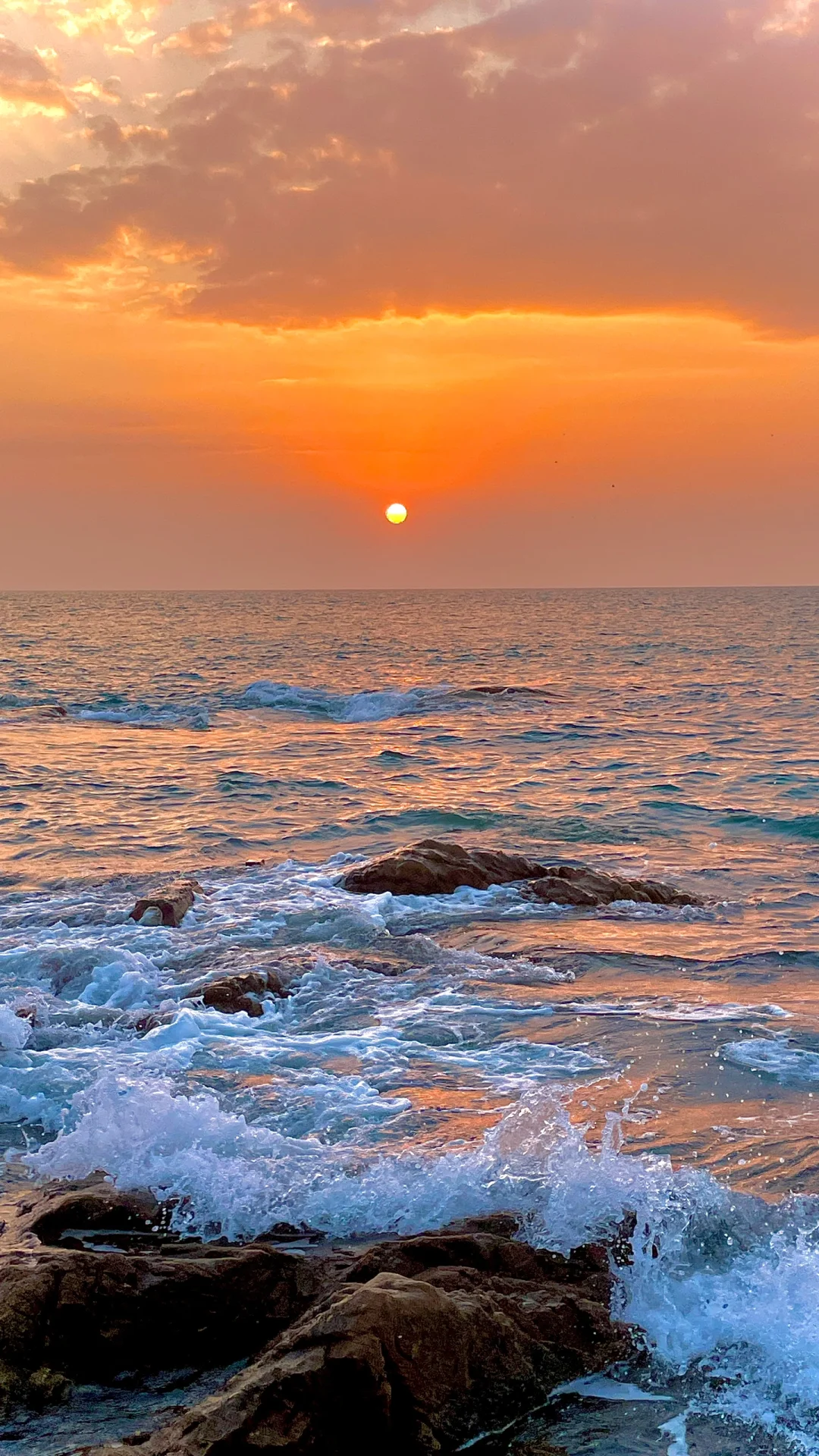 海的浪漫，日落占一半