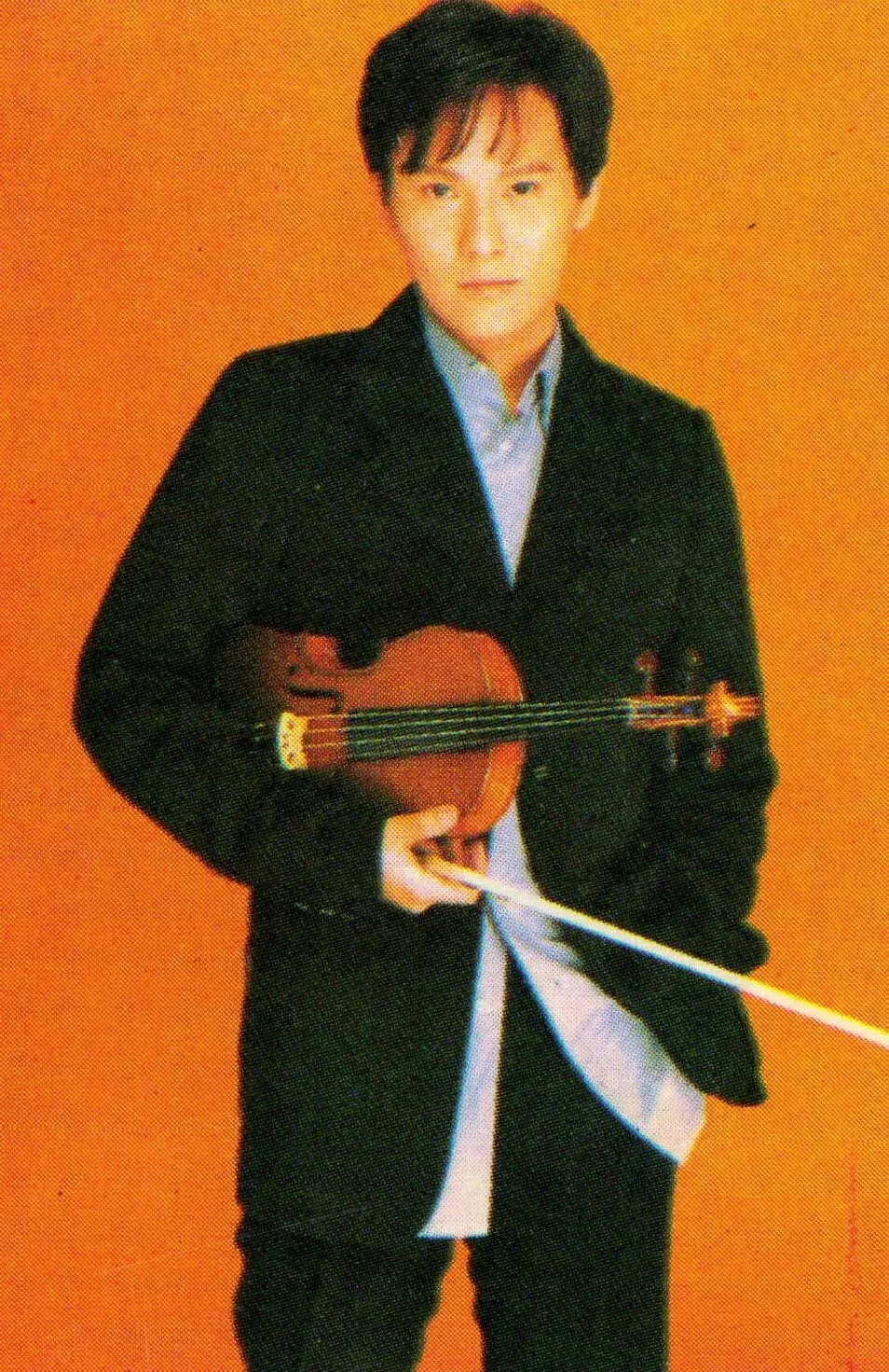 1996年丨张信哲以歌酬为家人置业