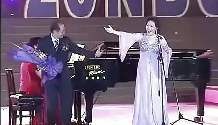 拿下国际大奖的胡晓平,10 首经典老歌,听过的人岁数都不小
