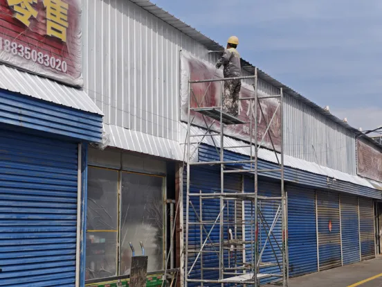 河曲县西口镇:墙面粉刷绘文明 市场“颜值”再提升