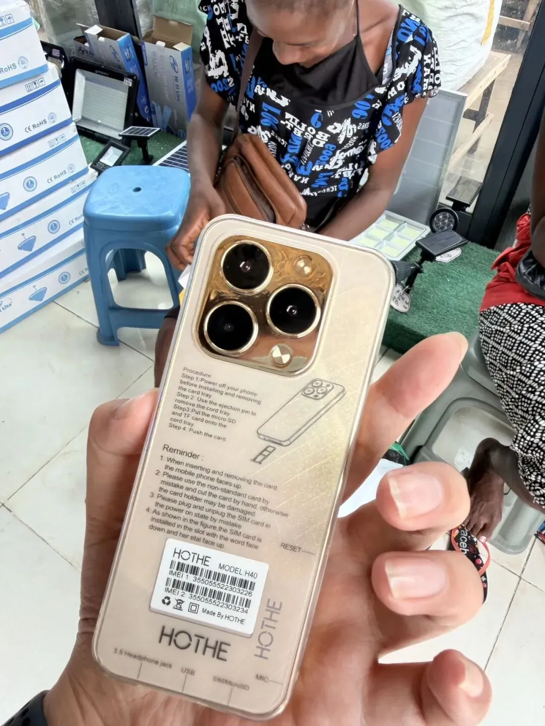 非洲市场惊现“山寨苹果”:3个大摄像头+金色背板,真机居然是老年机?