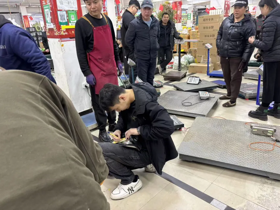 呼伦贝尔市质计所高效完成万家惠农贸市场计量器具检定,筑牢民生计量防线