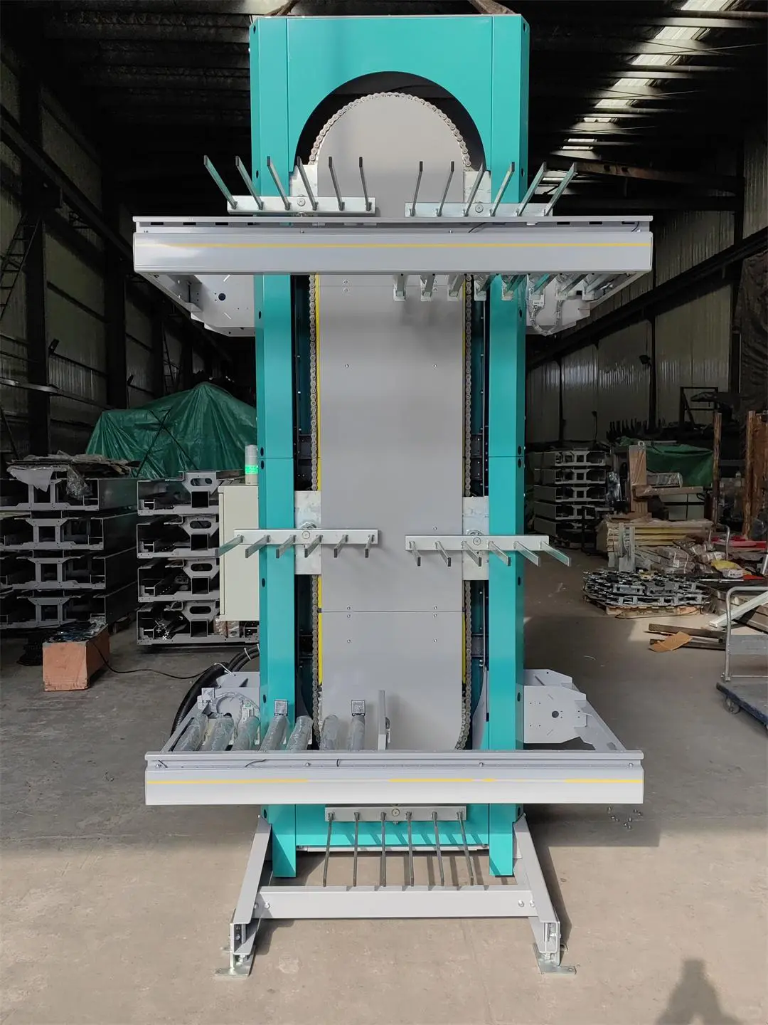 叉臂式循环提升机：驱动垂直效率的隐形引擎